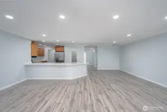 A view of the Kitchen and the Family and Dining Room