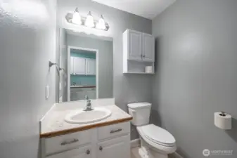 Convenience counts! This handy 1/2 bath is just steps away from the projects in you garage!