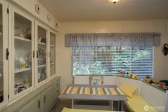 Cute corner table and built in hutch
