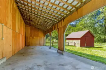 Inside the three open bays at the end of the building.