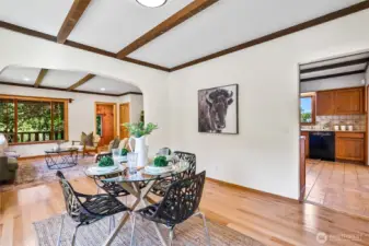 Formal dining to living and kitchen.