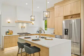 The kitchen is more than just a space—it’s the heartbeat of the home. Picture yourself preparing meals at the commercial-grade range, rinsing fresh herbs beneath the pot filler, and sharing wine with friends at the island, laughter echoing into the open-concept living area.