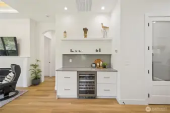 Built in Wine fridge and additional buffet counter space.