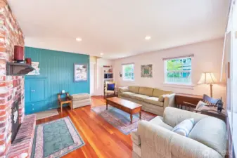Living room furniture includes a sleeper couch for overflow guests.