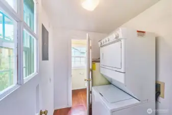 Laundry / mudroom off kitchen with a half bath beyond.