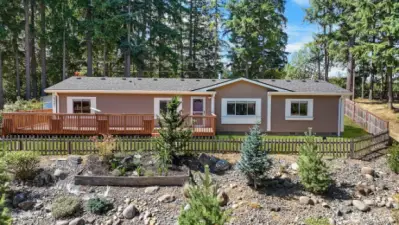 Fresh exterior paint and a new 30 year architectural roof are some of the many thoughtful updates to this turn key home! Lawn has been edited for photography purposes.