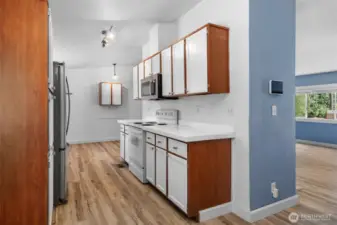 Dual access points to the kitchen allow so many possibilities for the adjacent areas.
