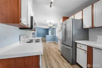 Prepare your meals with plenty of counter space, with direct access to the dining area.