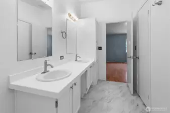 The walk in closet in the bathroom adds convenience and functionality.