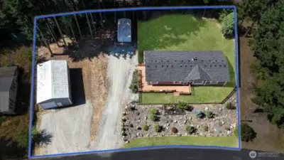 This property has an oversized lot, a rare find! Lawn has been edited for photography purposes. Blue boundary lines are approximate. Buyer to verify to own satisfaction.