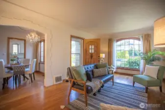 Original hardwood floors and leaded glass windows