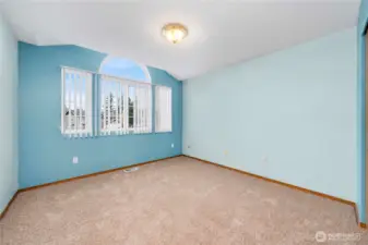 Open nice size bedroom with natural light