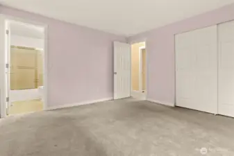 Primary bedroom including ensuite with full tub and shower