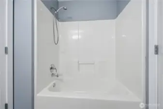 Tub shower combo in hall bath
