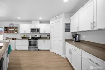 Plenty of storage with between pantry and cupboards.