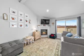 Living area with gas fireplace.