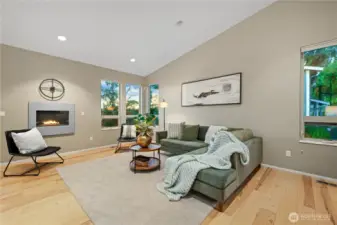 Here you can see the gas fireplace for cozy evenings by the fire. The extravagant wall space provides gallery space for all of your favorite art pieces (large & small).