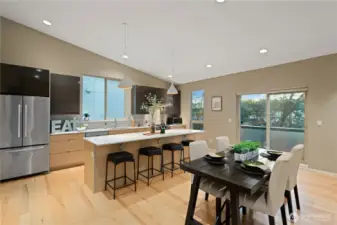 The kitchen is laid out to save steps during meal preparation. The stainless appliance are newer and the gas range & stove are framed by the glass tile back-splash and gorgeous quartz counters. All of the appliances are included in the sale.