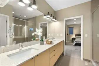 This double vanity features wonderful cabinet drawers and the under cabinet storage is ample.