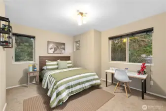 This second guest room also feature ample room for a king or queen bed, plus a desk area to complete the layout.