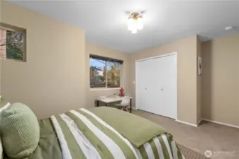 Here you can see an additional double closet and the desk nook that fits perfectly in this large & comfortable room.