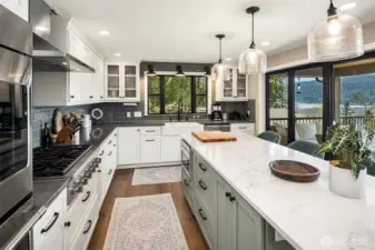 Remodeled kitchen; Quartz island, Thermador Gas Cooktop, GE Cafe double oven, microwave drawer, Bosch refrigerator/dishwasher, and pantry.