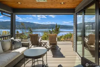 Dual NanaWall doors to a covered, heated deck – with stunning views - perfect for outdoor dining/lounging.