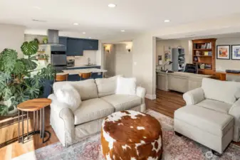 A perfect setup for extended family or guests downstairs with a Brand new, second, full kitchen with custom cherry cabinets. Large double recreation room with a gas fireplace, built-ins, with two desks-perfect for kids & homework. Huge laundry room. Relaxing steam shower. Double doors to lower decks.