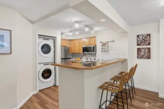 European style kitchen with new washer and dryer