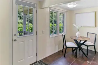 front Porch opens up to the entry way with an eating area by the window.