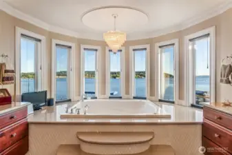 Spa-style primary bath-dual vanities, deep soaking tub, and elegant finishes throughout.