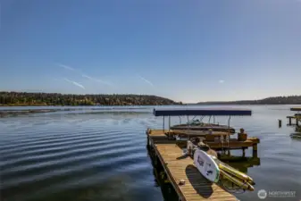 Private dock with covered boat lift + multiple watercraft lifts. The ultimate setup for Lake Washington fun-just steps from home.