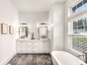 Primary bath, with 2 sinks and soaking tub.