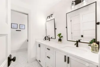 Upper bath with two vanities.