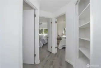 Hallway into Bedrooms 1 and 2. Storage galore!