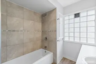Full Bathroom with Tub Shower with Tile