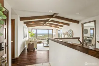 View from the font door looking into the living room with vaulted ceilings