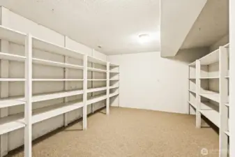 Large storage room in the lower level. Could be a great home gym or perfect theater room