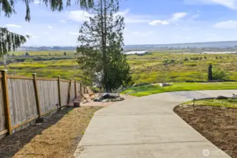 Driveway to the lower level with additional 2 car garage