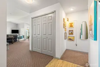 Welcoming entry, tons of storage, including a laundry area with newer washer and dryer