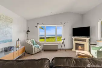 Vaulted ceilings, cozy electric fireplace, and views for miles