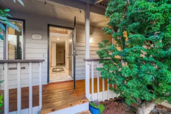 Great front porch with a screen door facing west