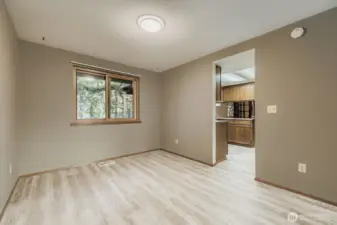 The formal dining room overlooking the backyard adjacent to the kitchen
