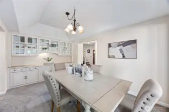 Gracious dining room with built-in cabinetry adds beauty and functionality.