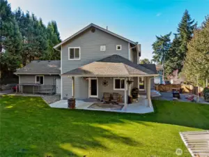 Enjoy the outdoors year-round on the covered wraparound back patio.