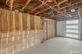 Garage floor is unfinished. Photo shows rendering.