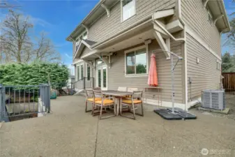 The extensive hardscaping in the back yard provides plenty of space to enjoy summer evenings under the stars.