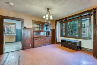 Dining room with fir floors and built in's with original wood. Great old school charm!