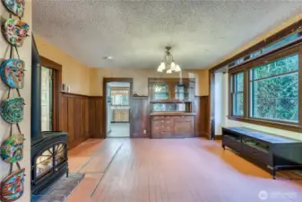 Spacious dining room with main floor bedroom to the left.
