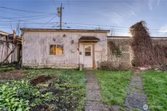 Large one car garage with additional shop space.  Such a great addition to this home.